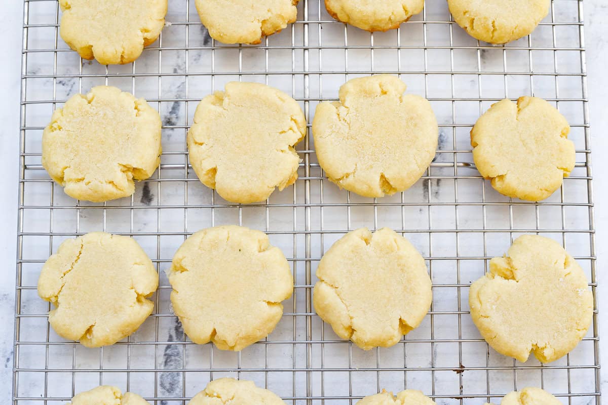 sugar cookies cooling on rack