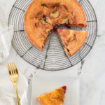 plum cake with a slice missing