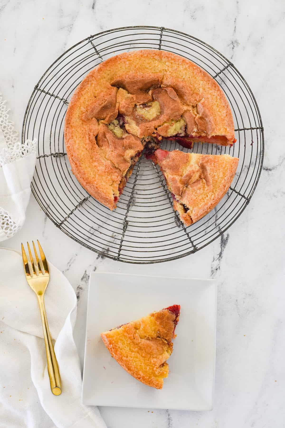 plum cake with a slice missing