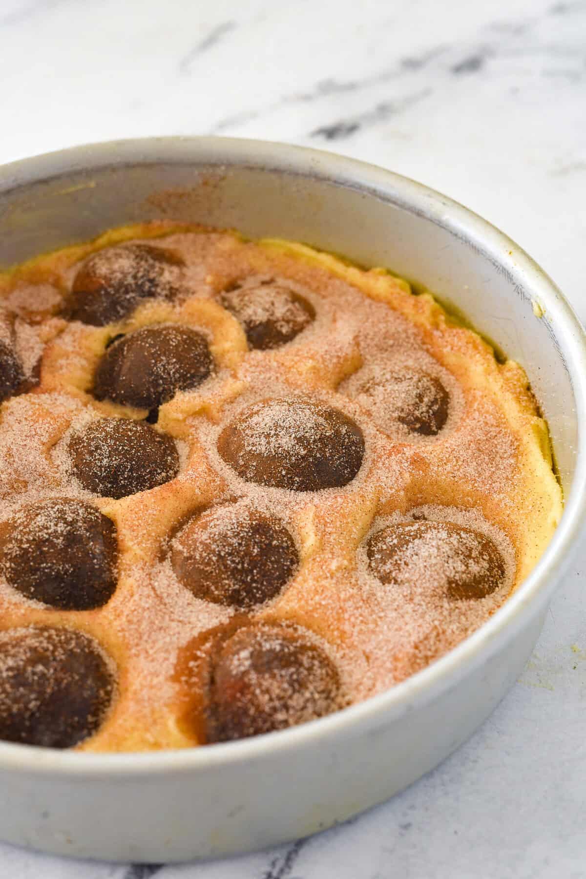 plum cake sprinkled with cinnamon sugar.