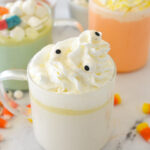 three mugs of halloween hot chocolate.