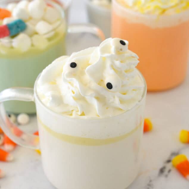 three mugs of halloween hot chocolate.