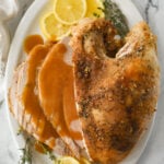 overhead shot of a turkey breast on a platter