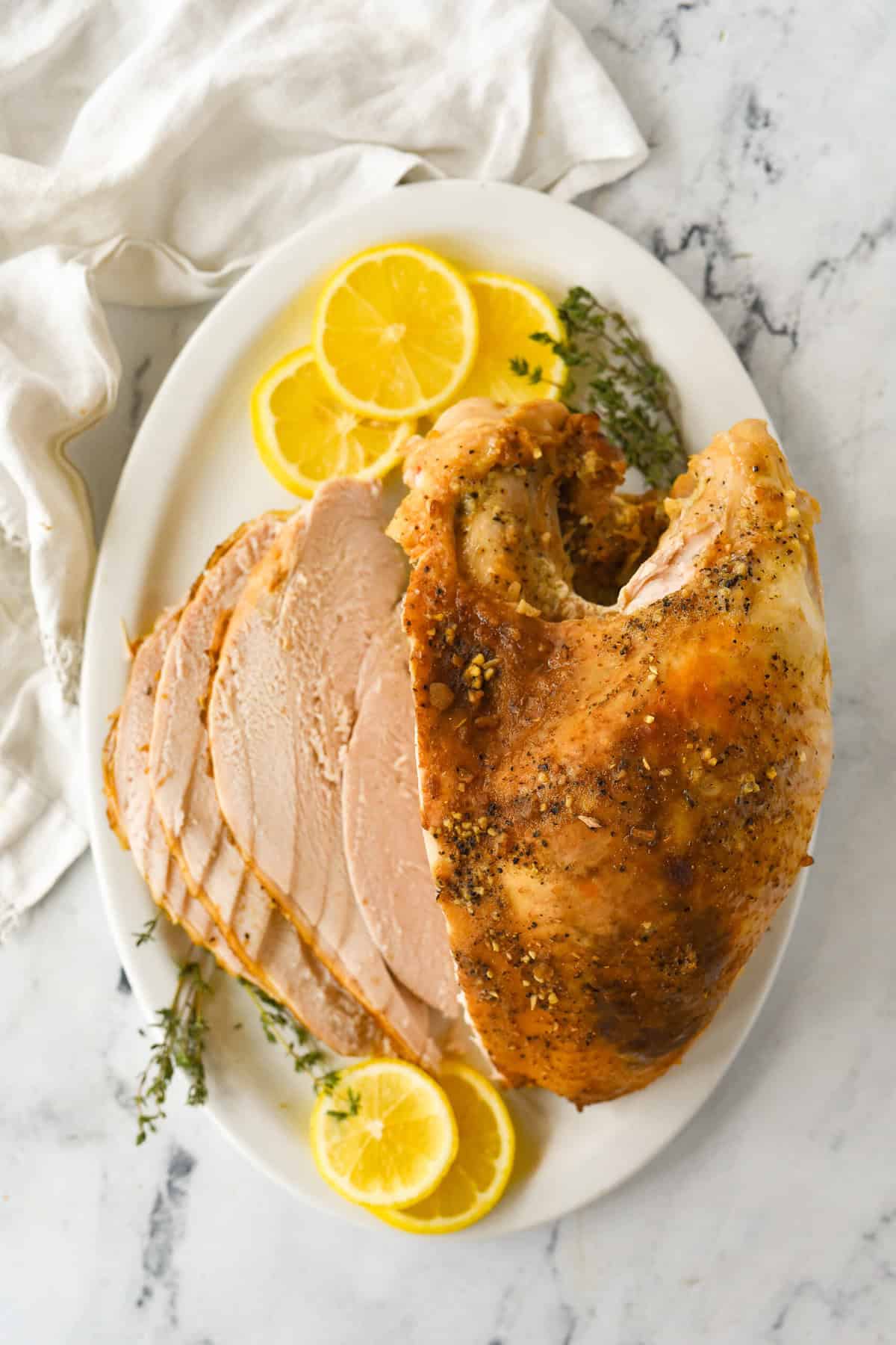 sliced turkey breast on platter.