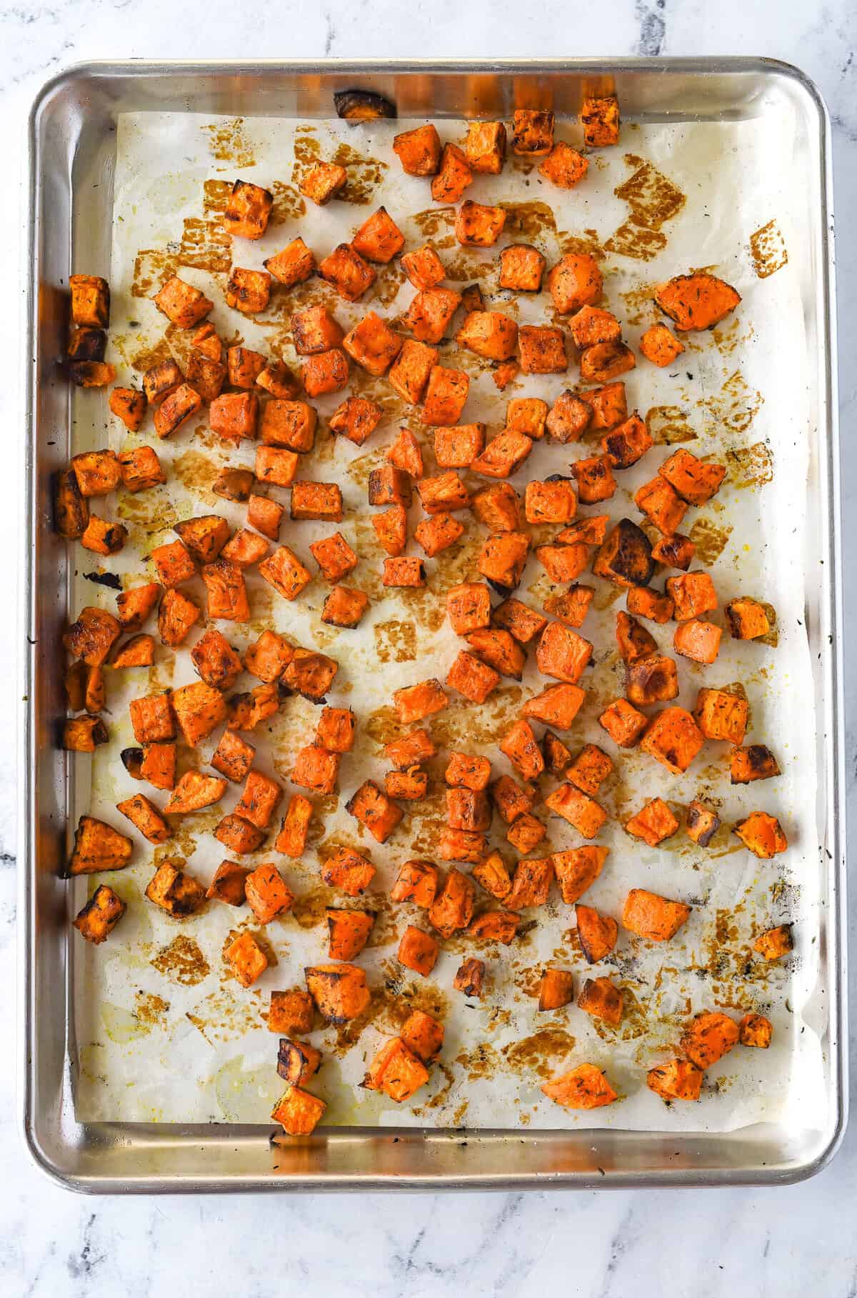 roasted sweet potatoes on a baking sheet