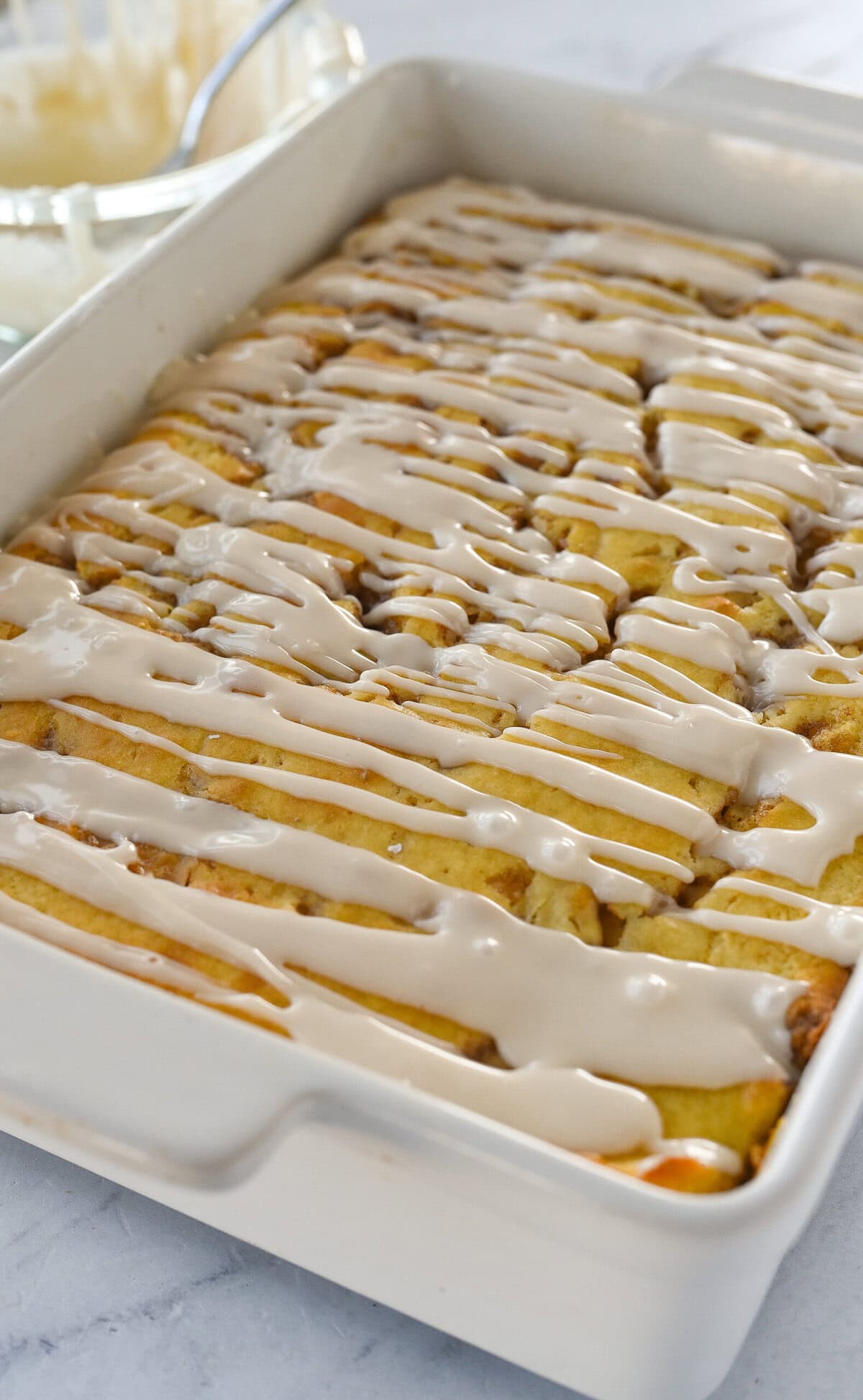 cinnamon cake with drizle on top.
