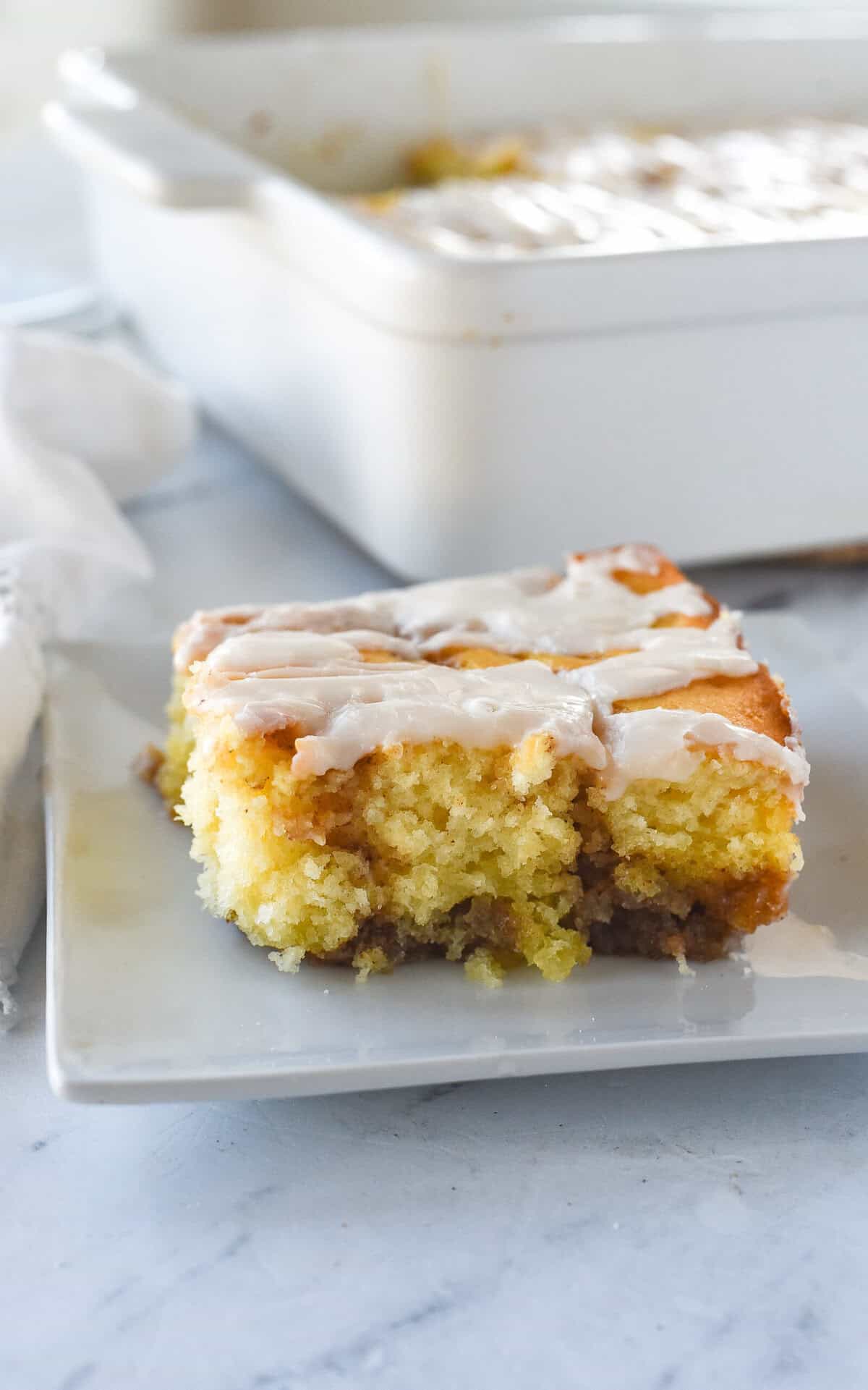 Cinnamon Roll Cake Slice of cinnamon roll cake on a plate