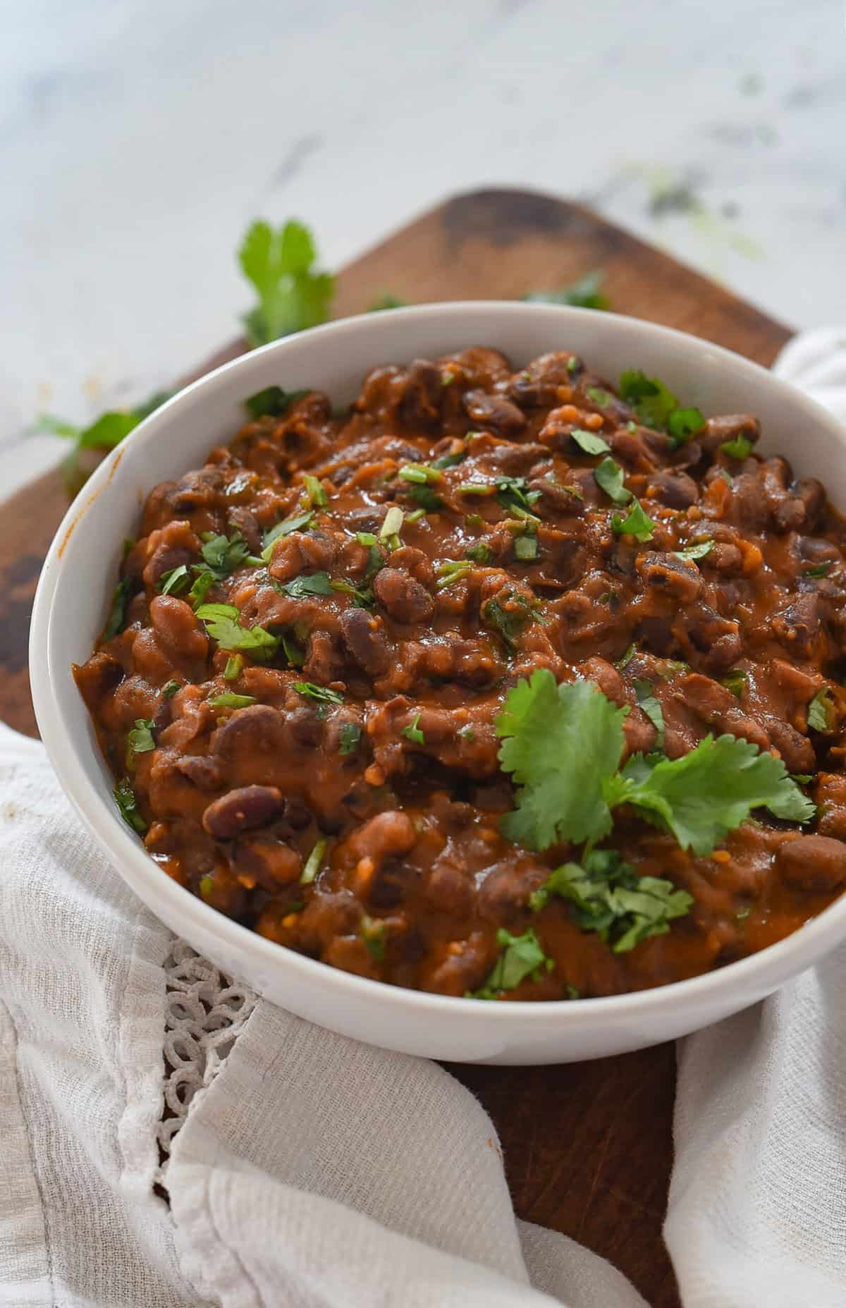 white bowl with black beans