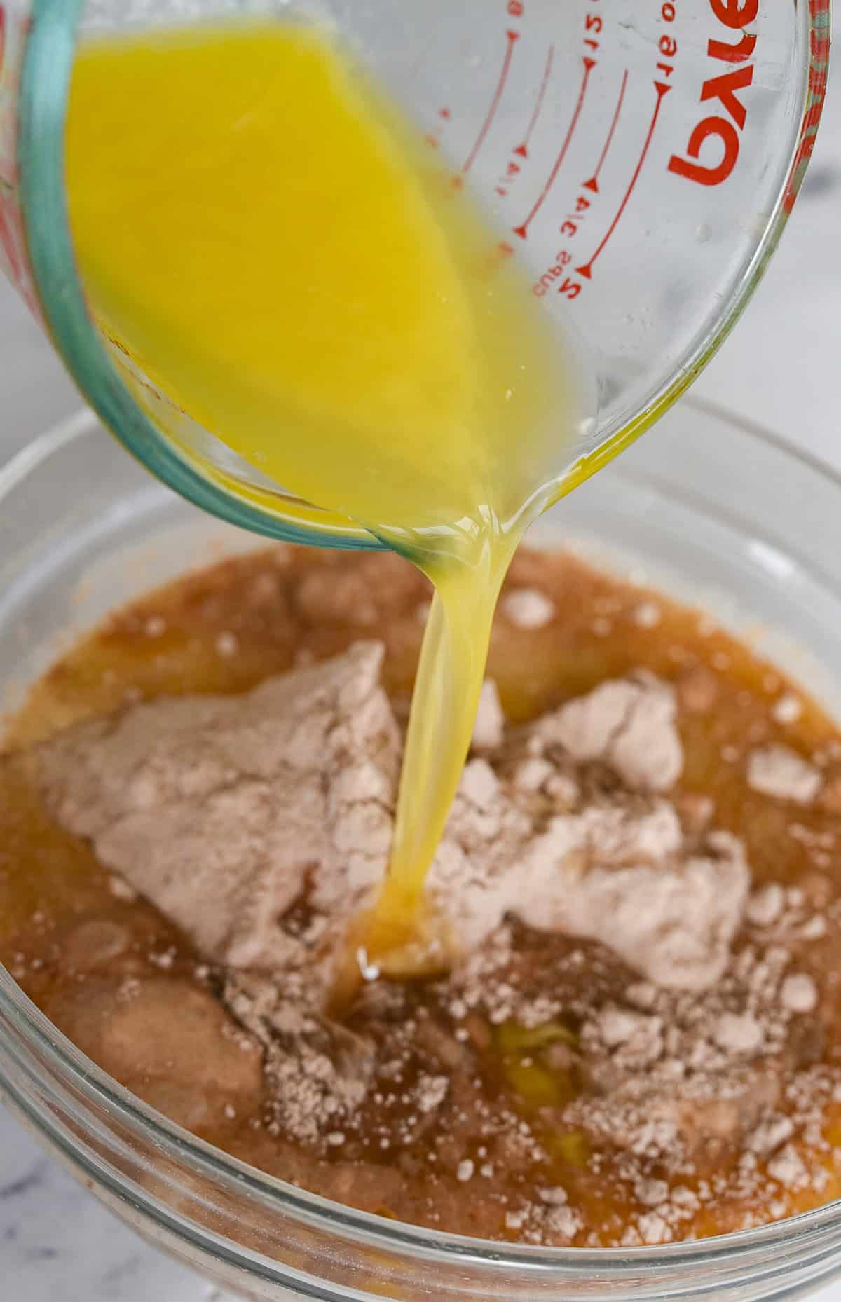 adding butter to cake mix
