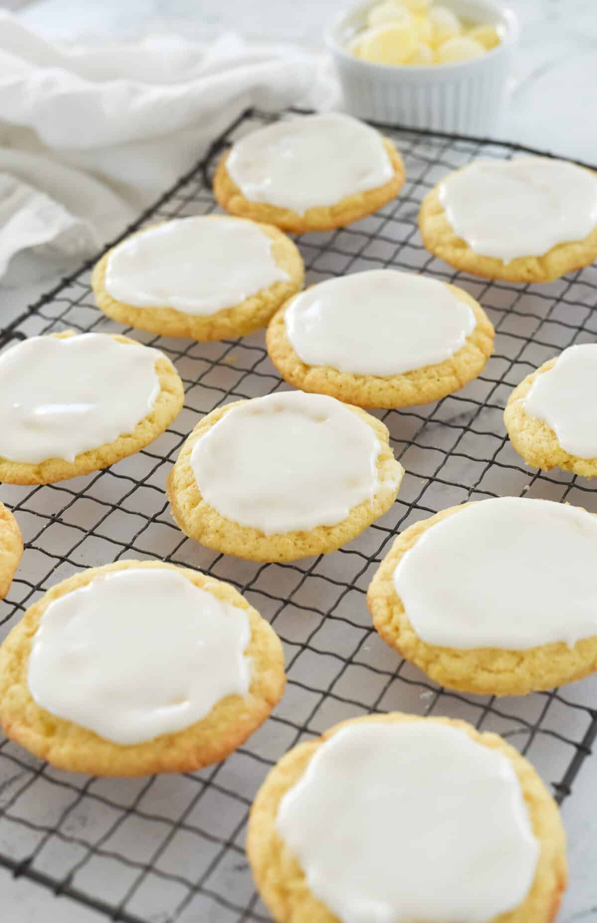 lemon drop cookies on cooling rack
