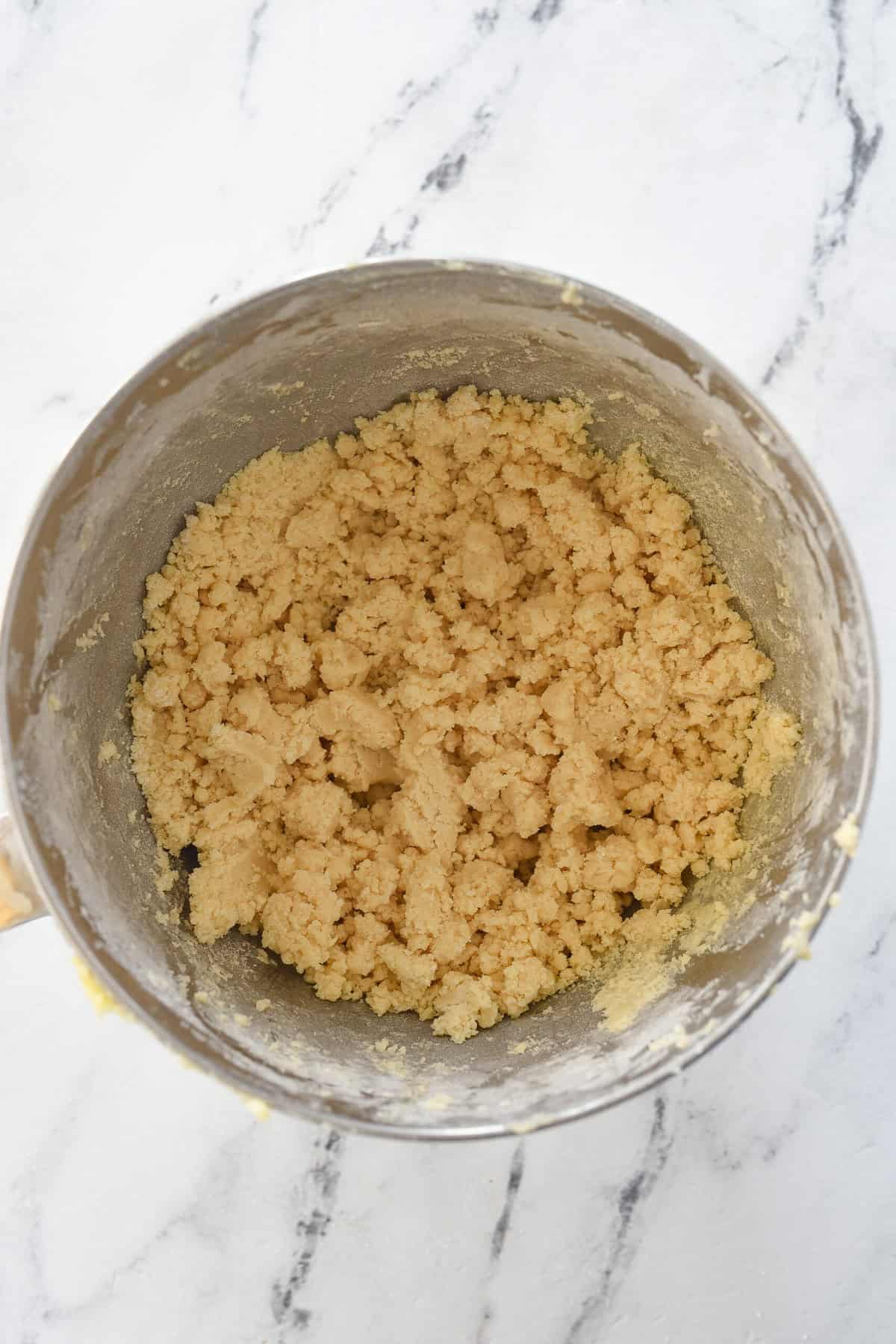 crumbly shortbread dough in a bowl