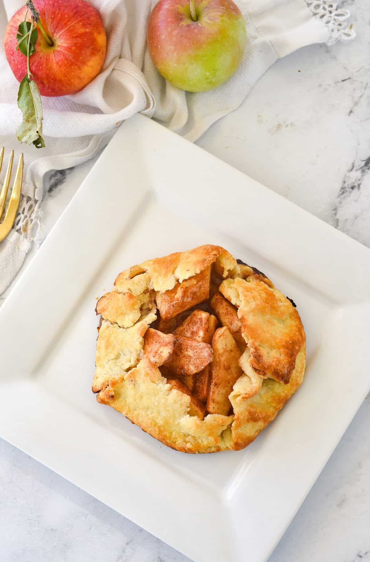 single serve apple galette on a pla te