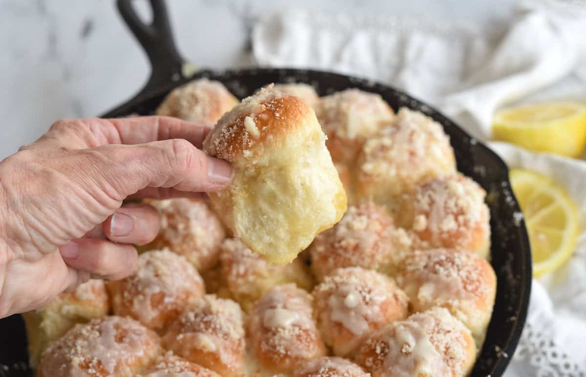 hand holding one lemon pull apart roll