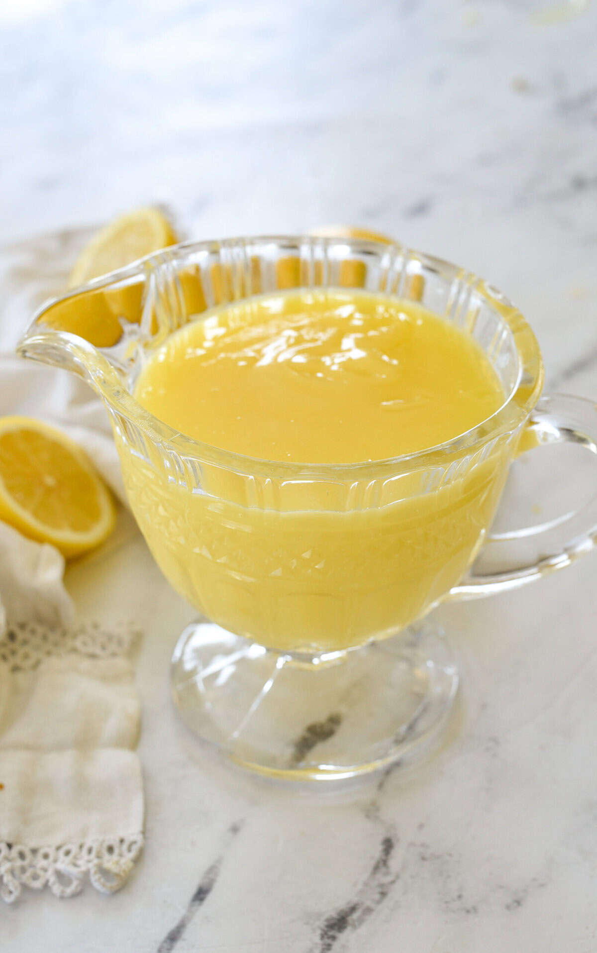 crystal pitcher full of lemon curd