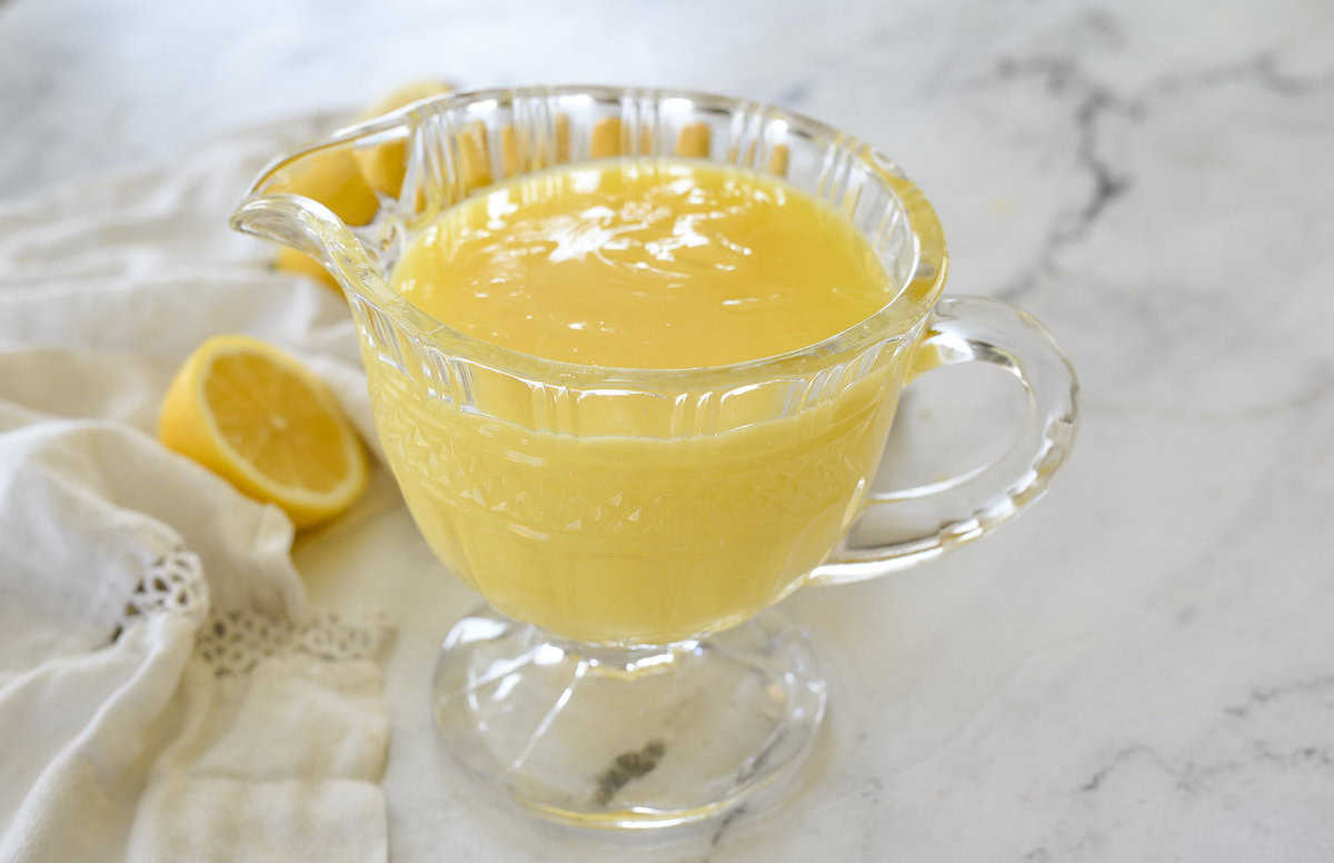 crystal pitcher full of lemon curd