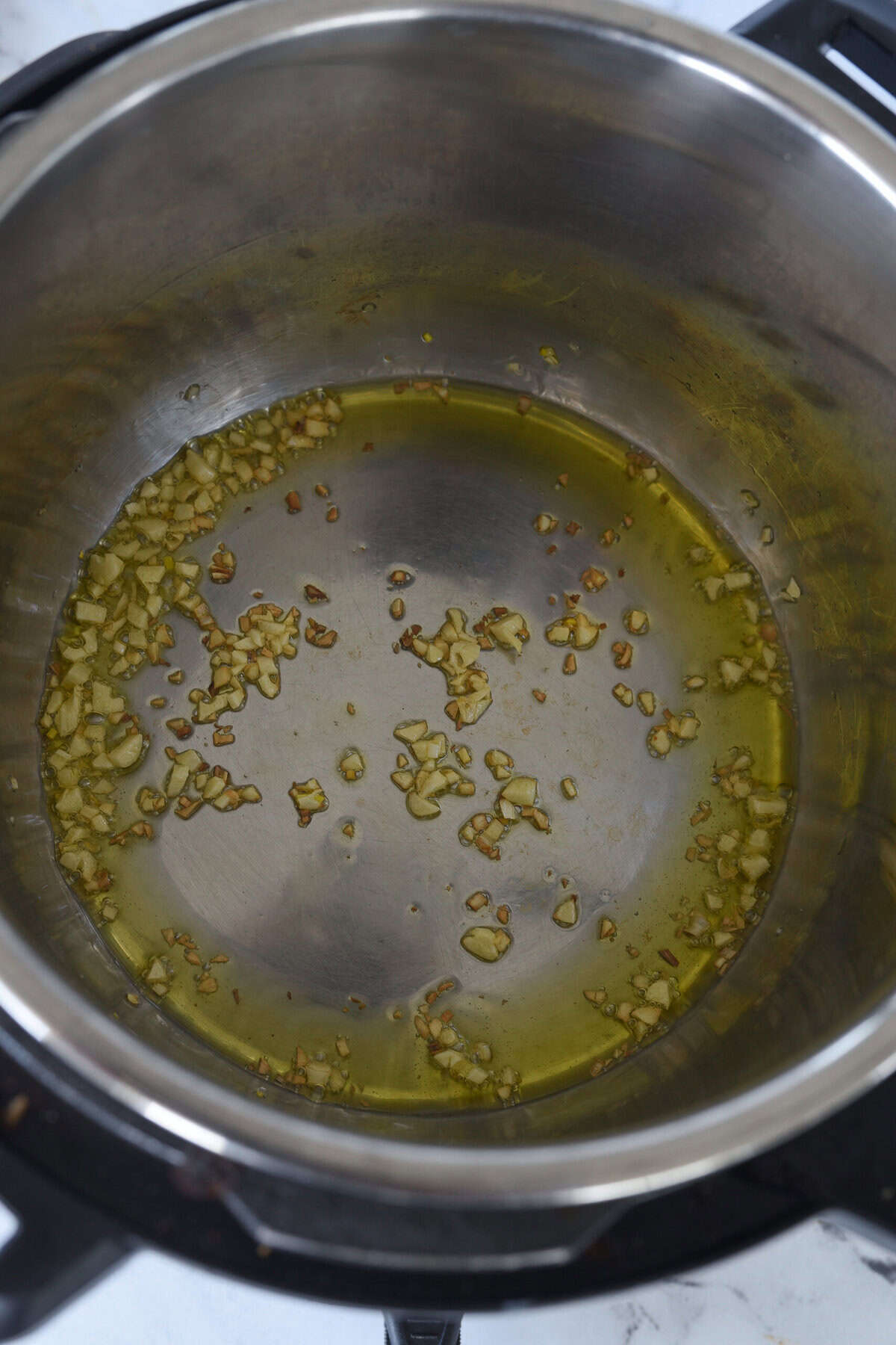 sauteeing garlic in olive oil in instant pot