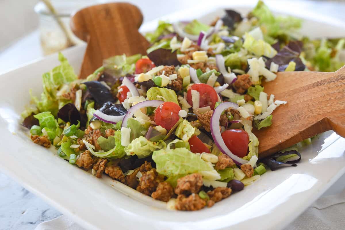chicken taco salad in a white bowl