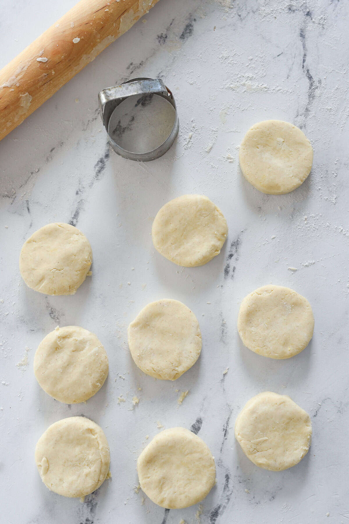 cutting out biscuits with biscuit cutter