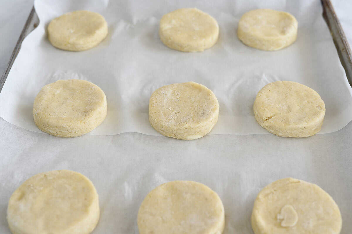 biscuits on baking sheet going into the freezer