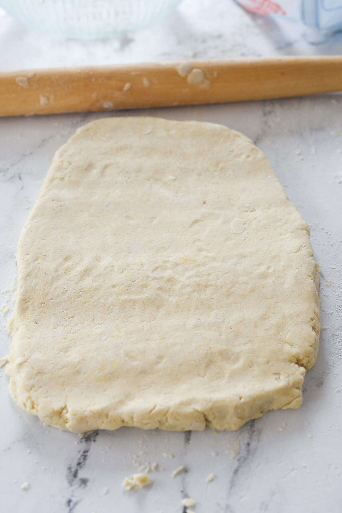 rectangle of biscuit dough on counter