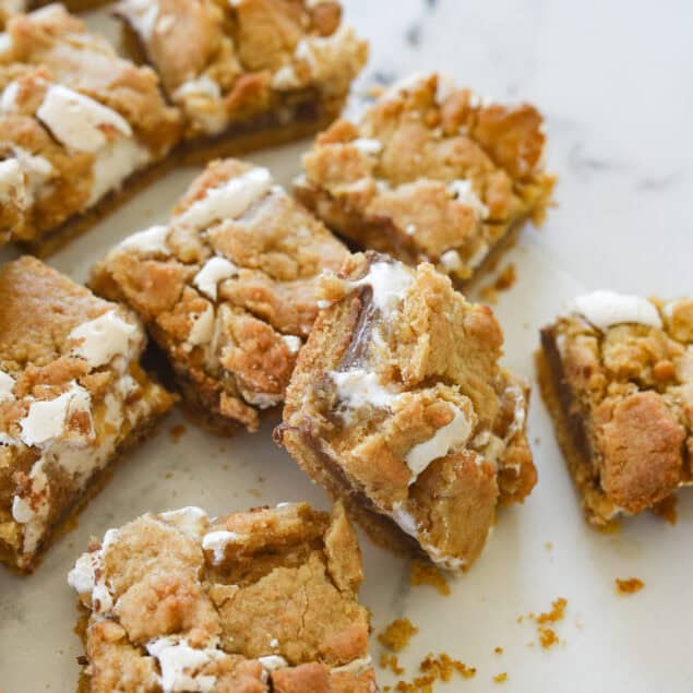 overhead shot of s'mores bars on a white counter