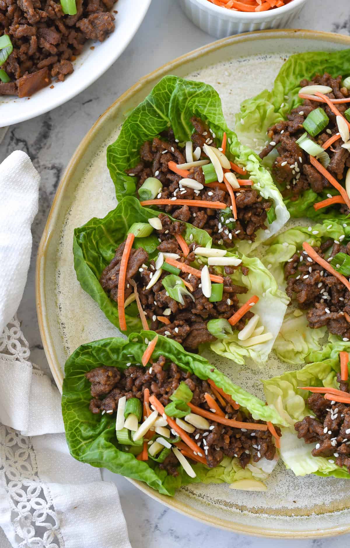 overhead shot of beef lettuce wraps on a plate

