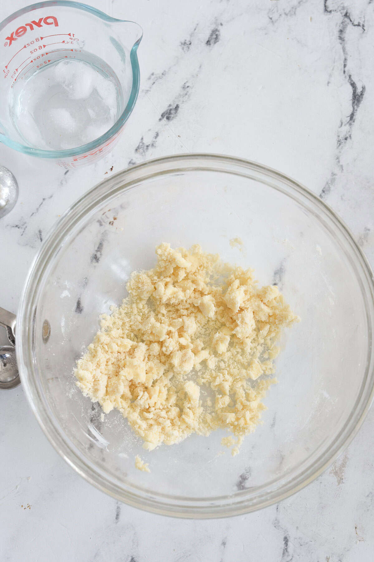 bowl with pie crust crumbs in it
