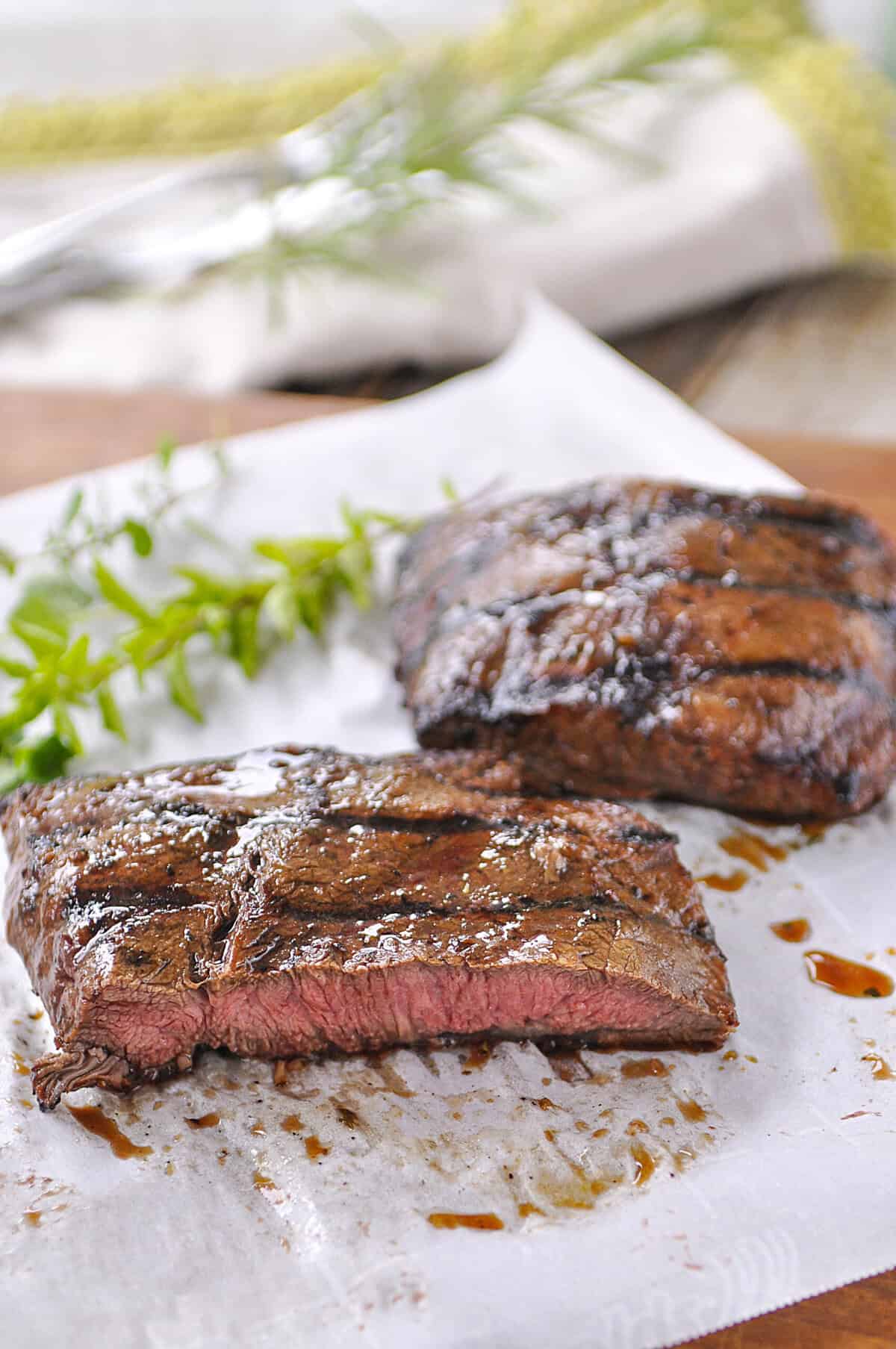 two marinated flat iron steaks