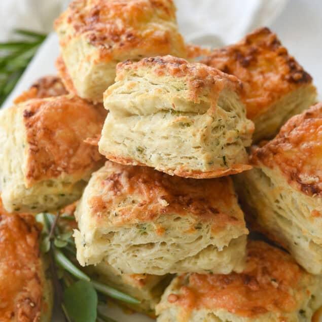 pile of cheese scones on a plate