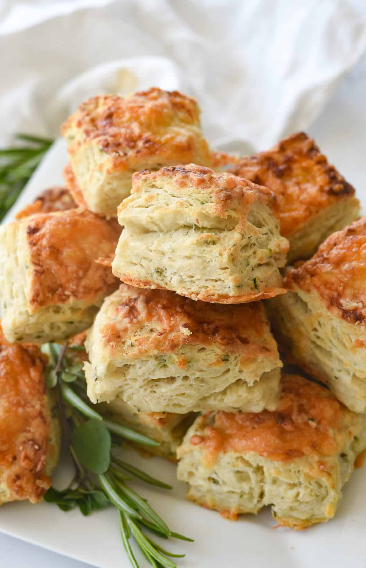 pile of cheese scones on a plate