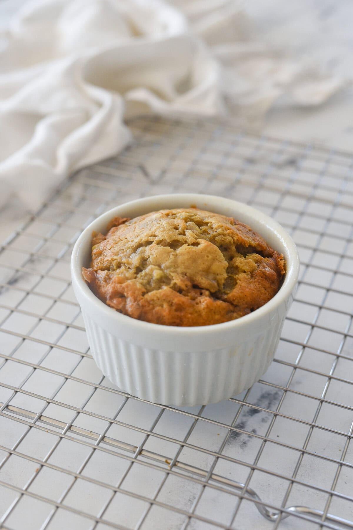 banana bread for one in white ramekin