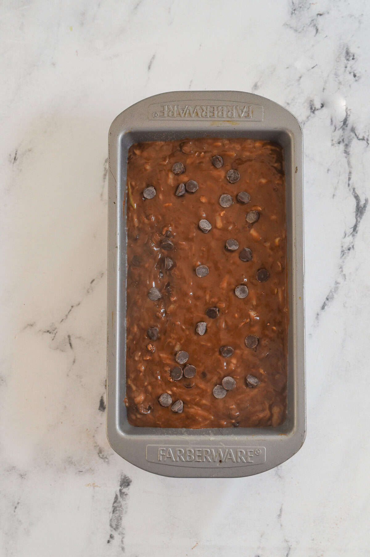 zucchini bread batter in pan