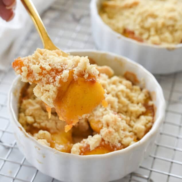 spoonful of peach cobbler for two