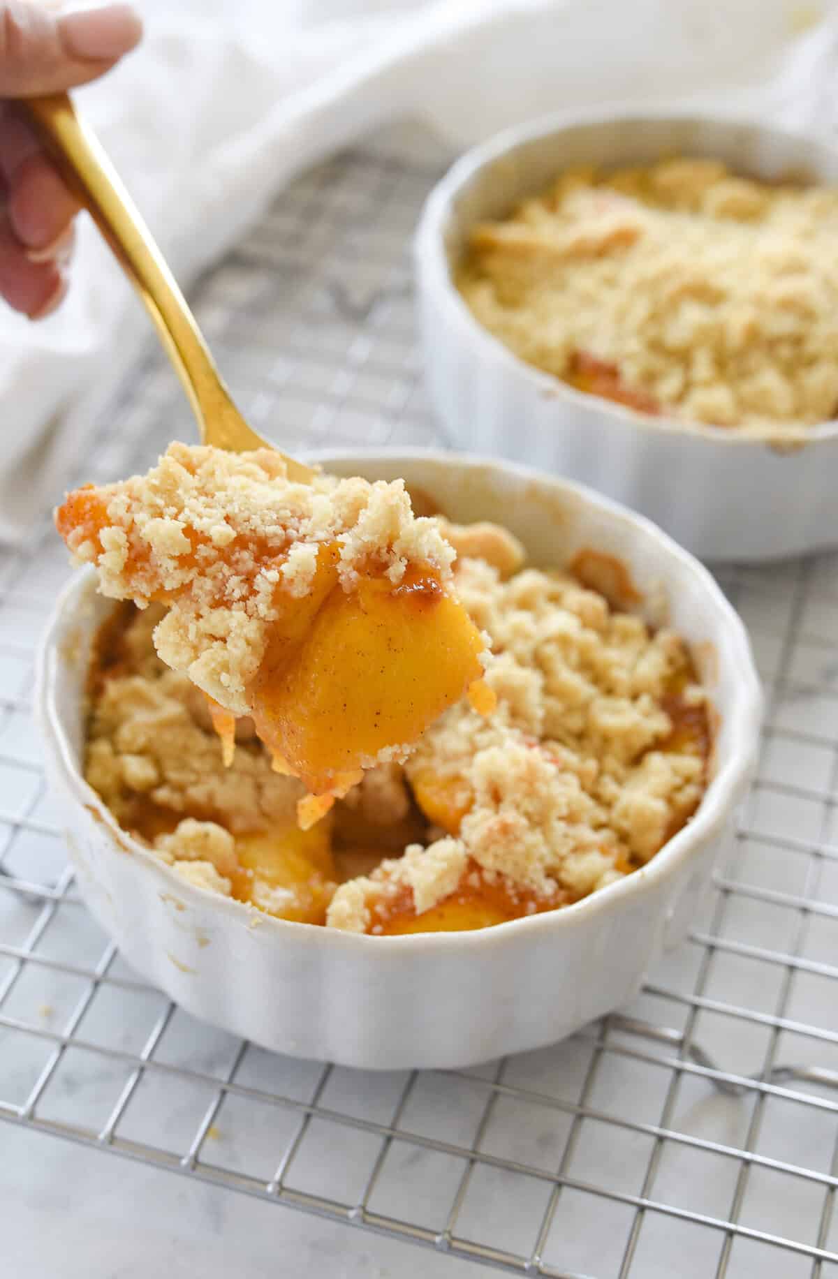 spoonful of peach cobbler for two