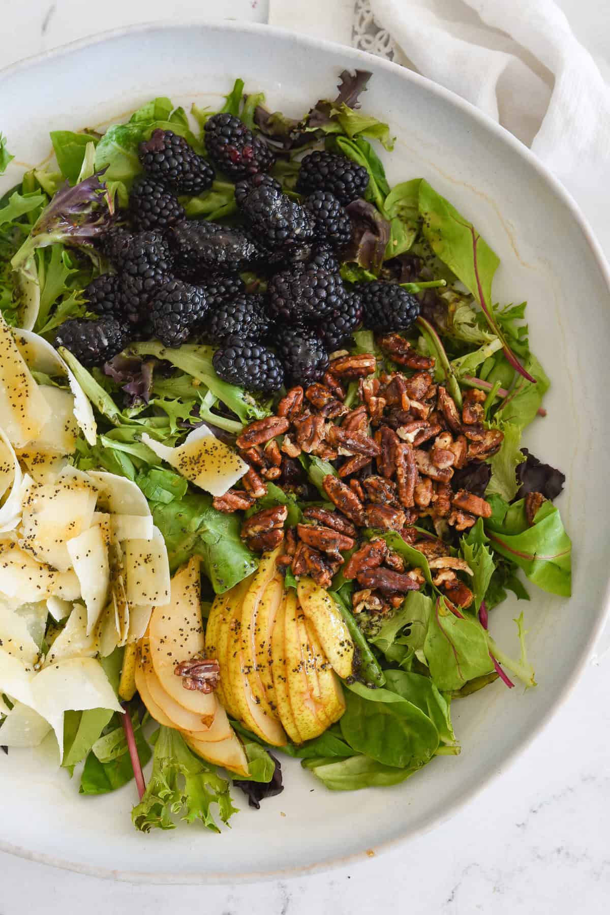 overhead shot of blackberry and pear salad
