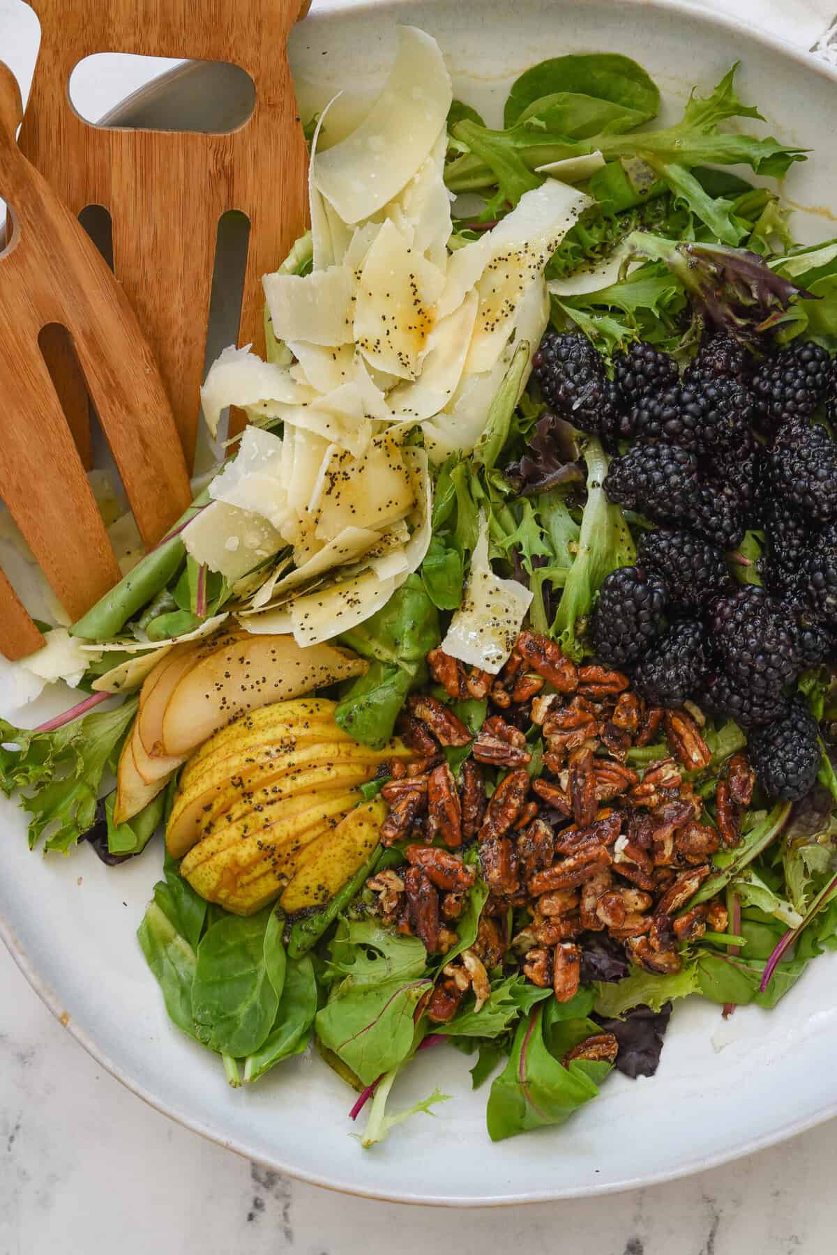 overhead shot of a blackberry ad pear salad