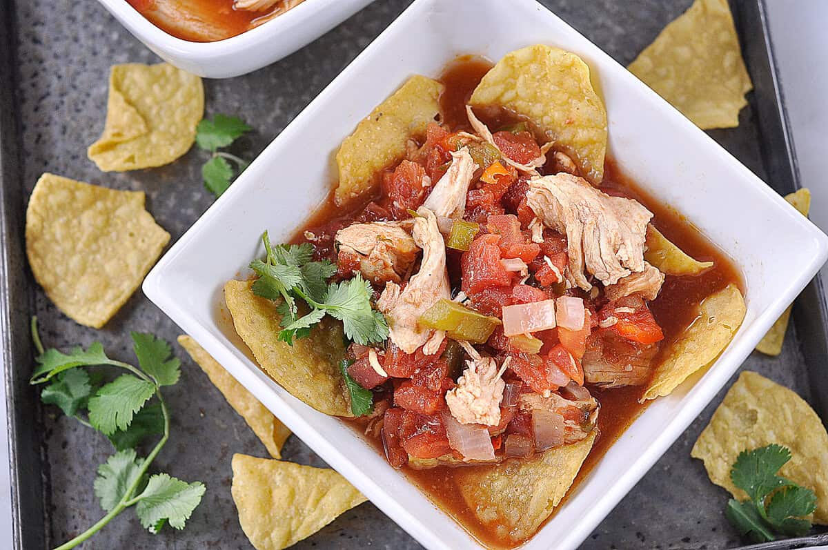 OVERHEAD SHOT OF A BOWL OF CHIPOTLE CHICKEN SOUP
