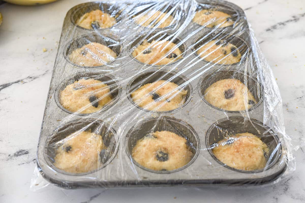 freezer muffins covered with plastic wrap