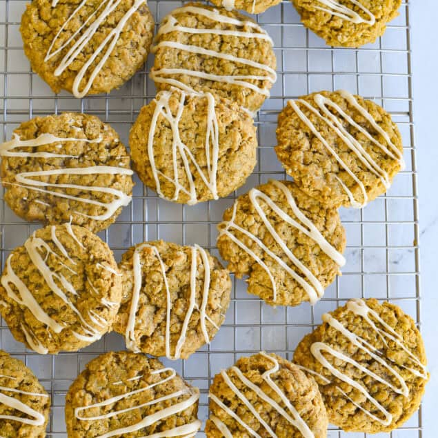 overhead shot of pumpkin oatmeal cookies on a cooling rack.