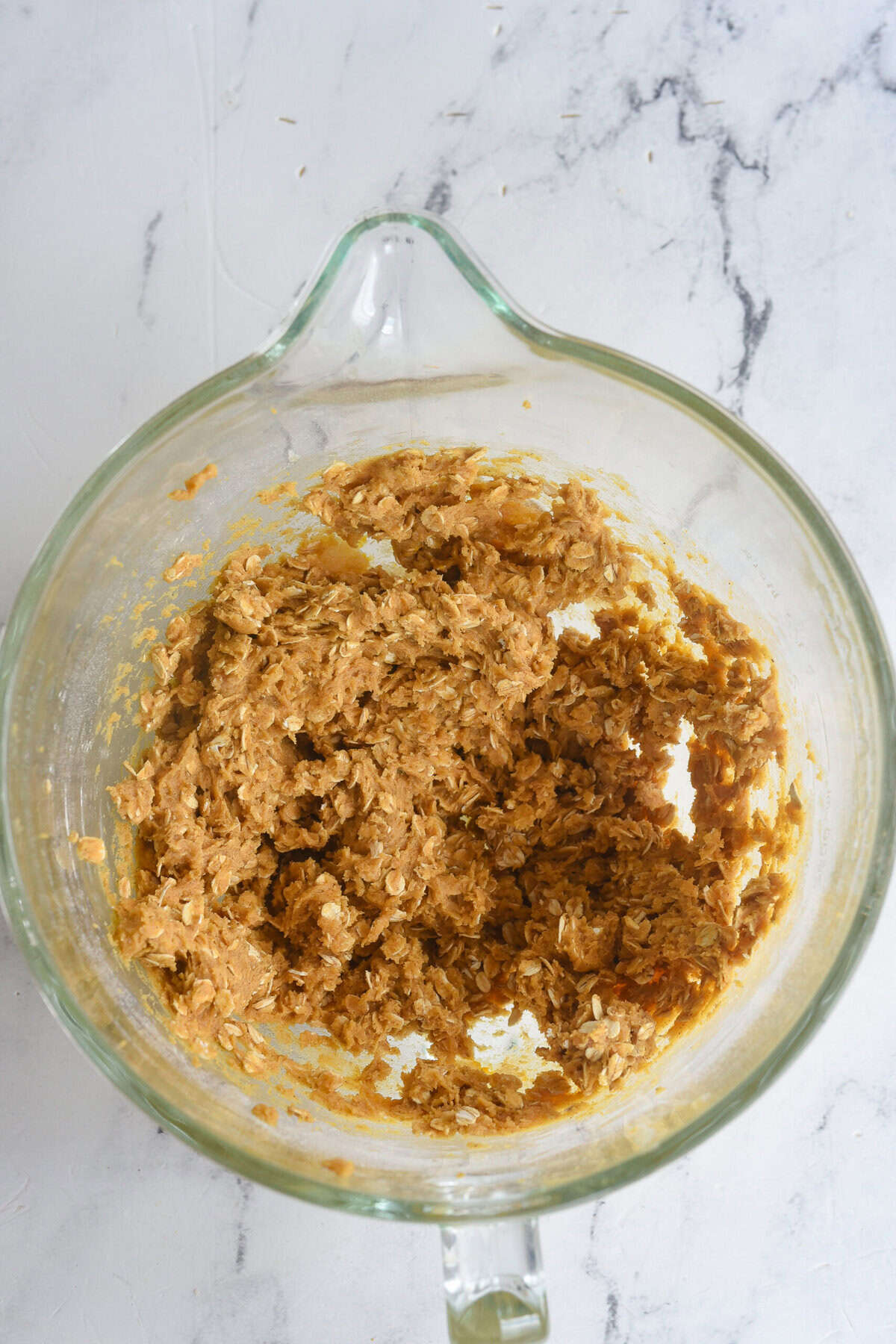 pumpkin oatmeal cookie dough in a bowl.