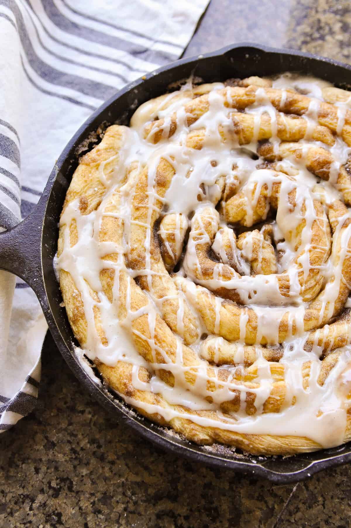 cinnamon skillet roll in cast iron pan