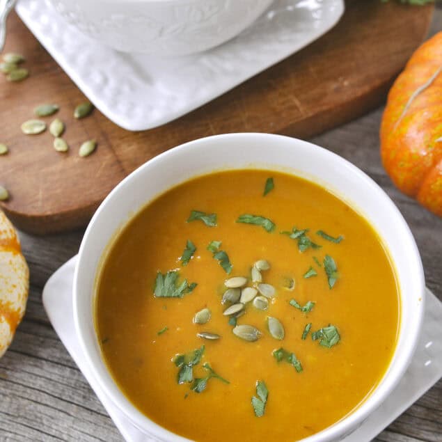 overhead shot of bowl of pumpkin curry soup