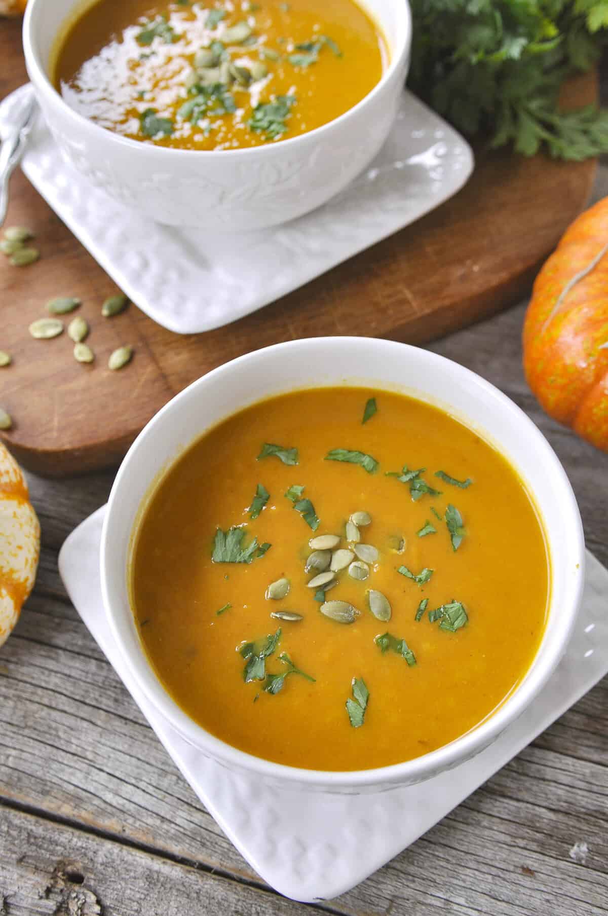 overhead shot of bowl of pumpkin curry soup