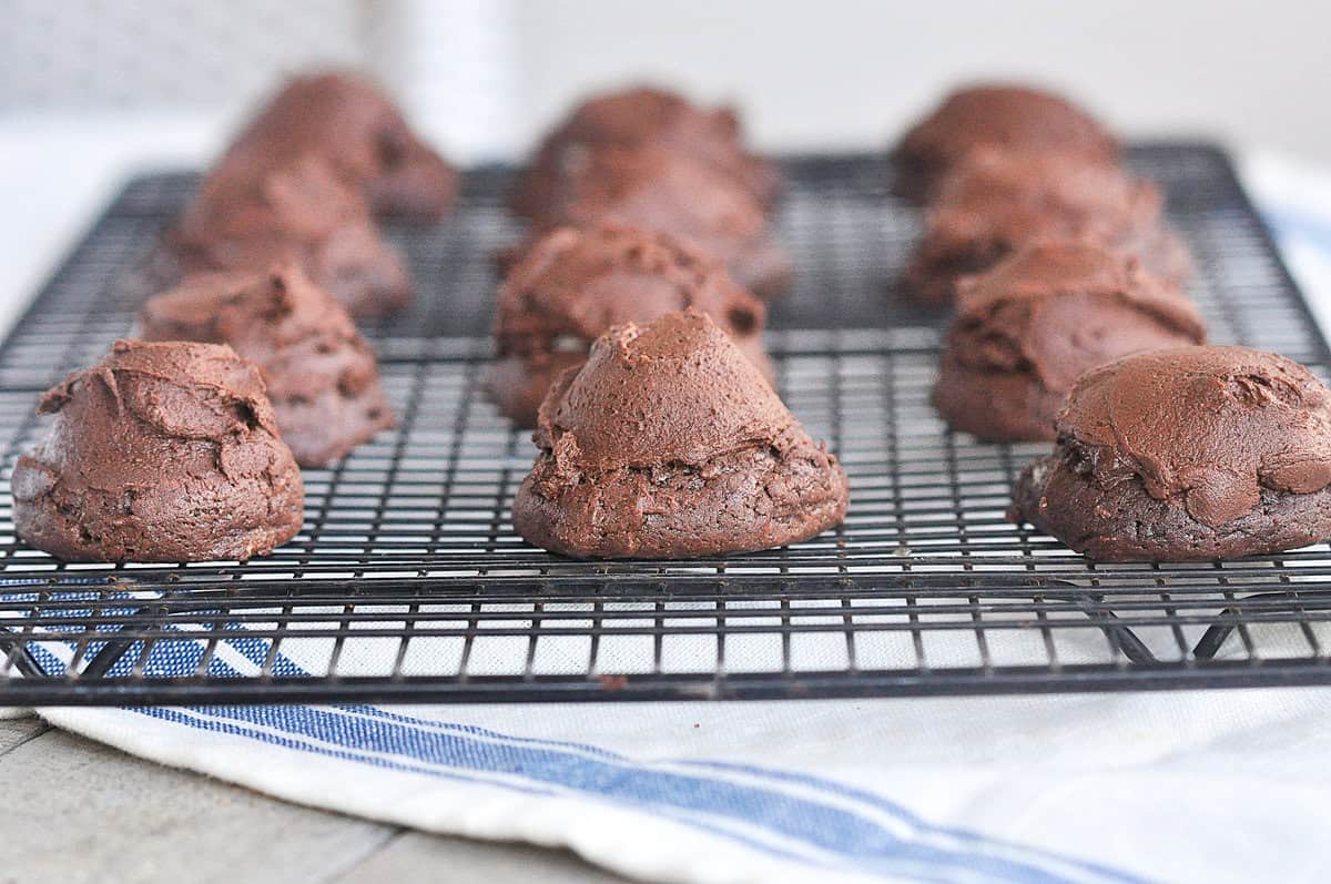 side view of chocolate marshmallow cookies on cooling rack