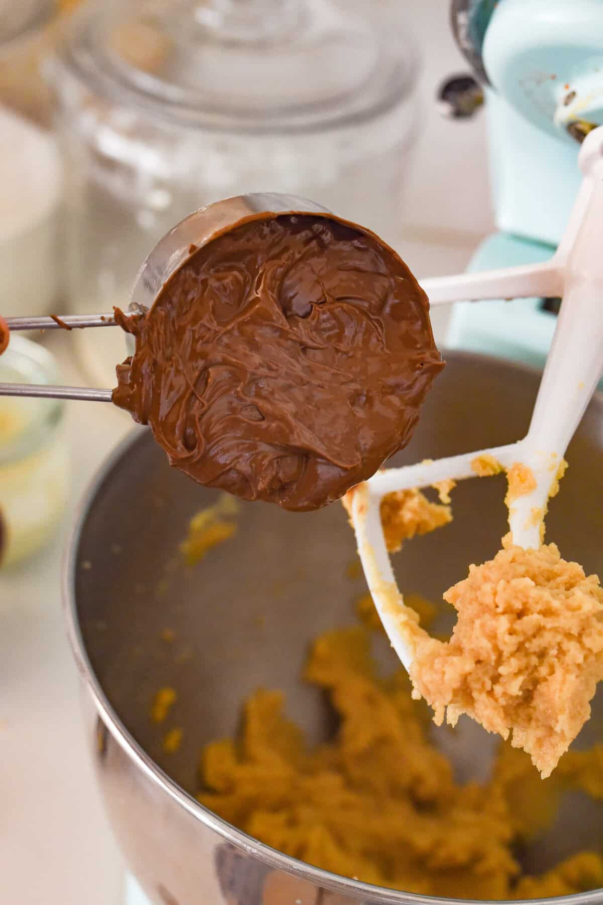 adding in Nutella to cookie dough