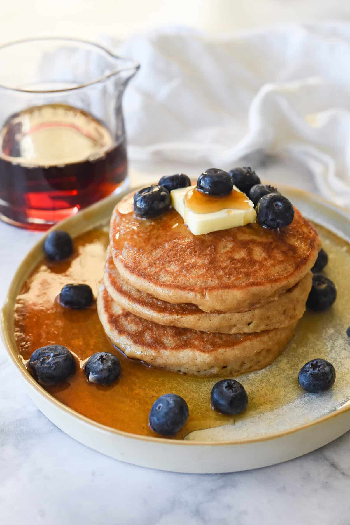 stack of three whole wheat pancakes