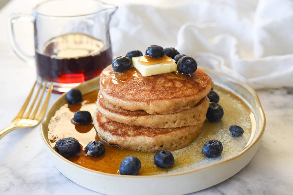 whole grain pancakes stack of three whole wheat pancakes