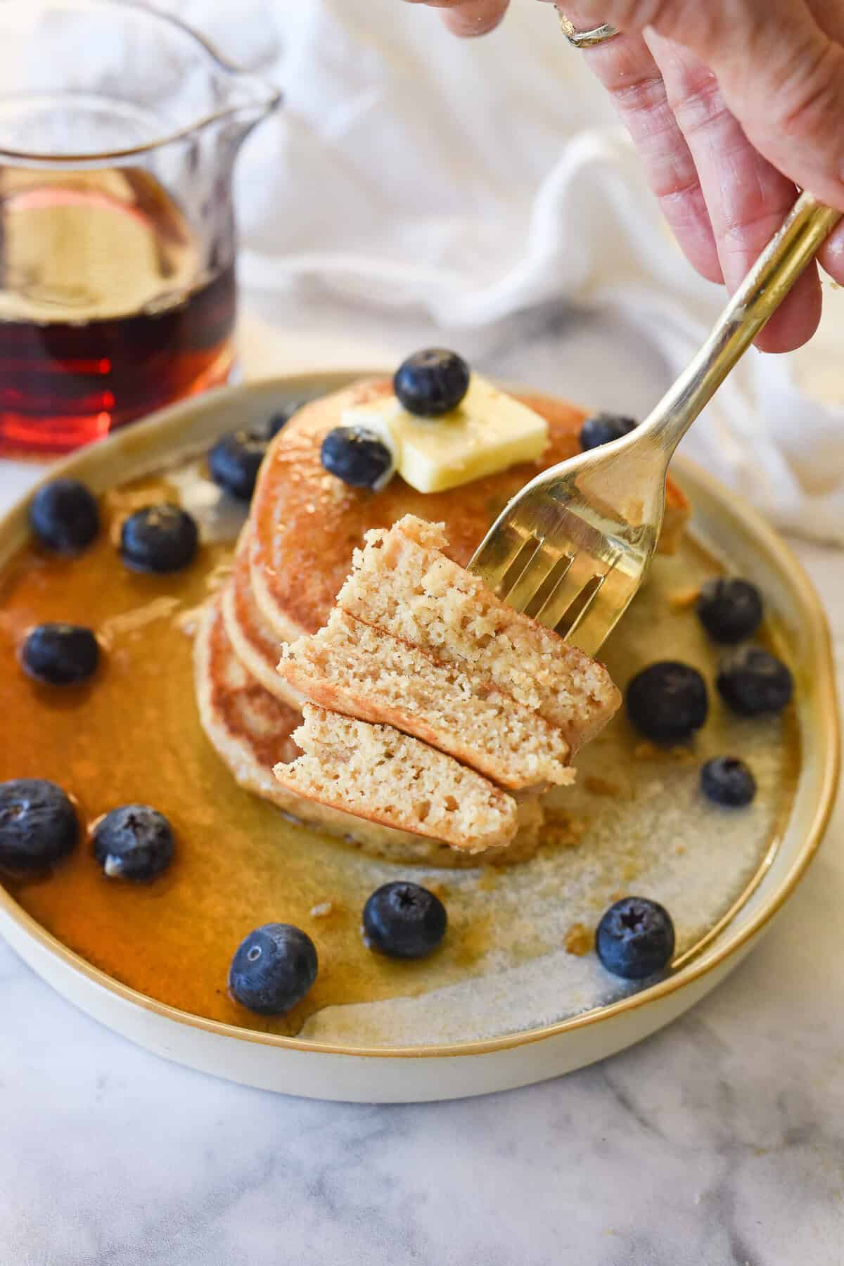 fork full of whole wheat pancakes