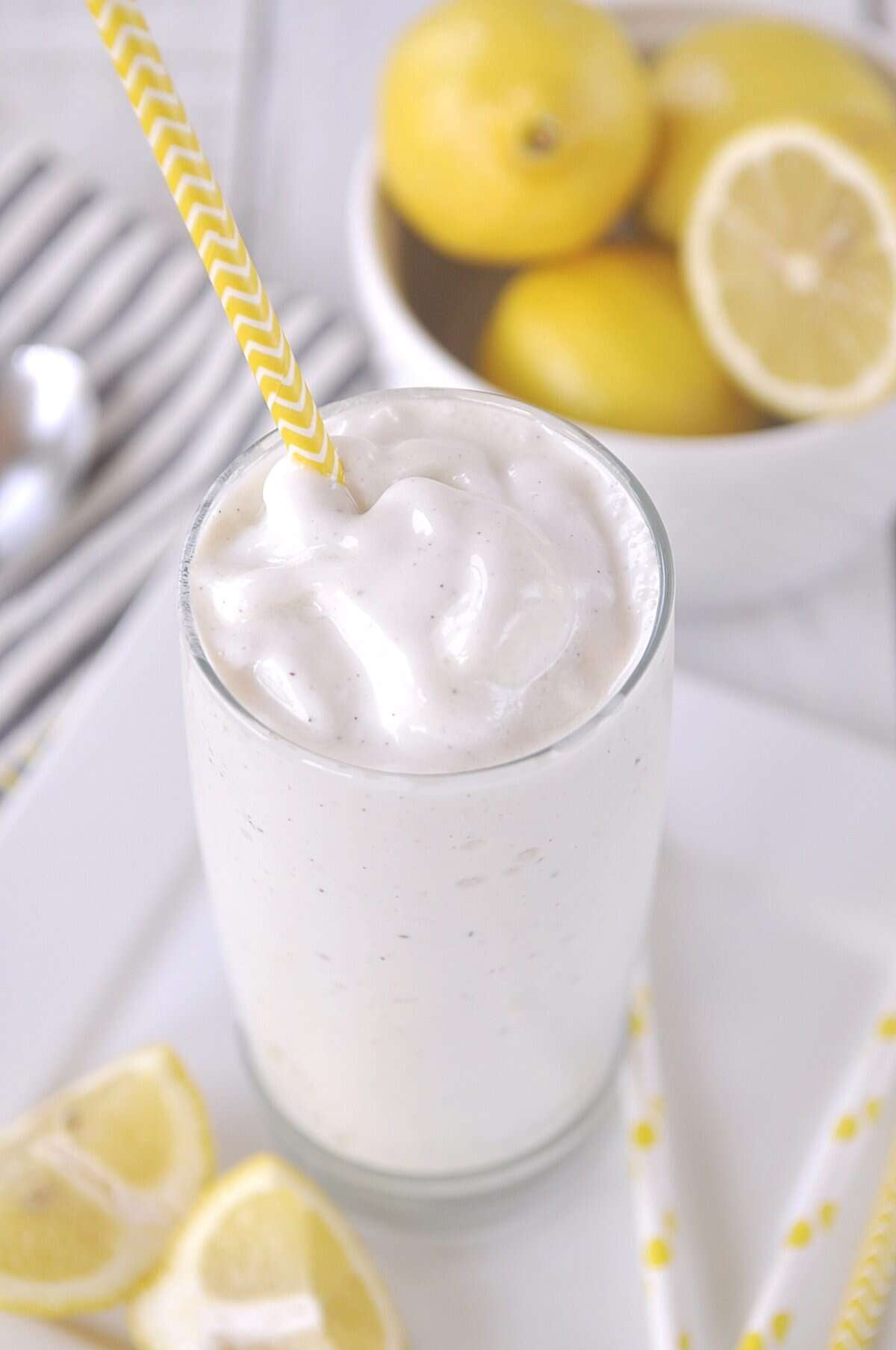 Frosted Lemonade tall glas of frosted lemonade with a straw