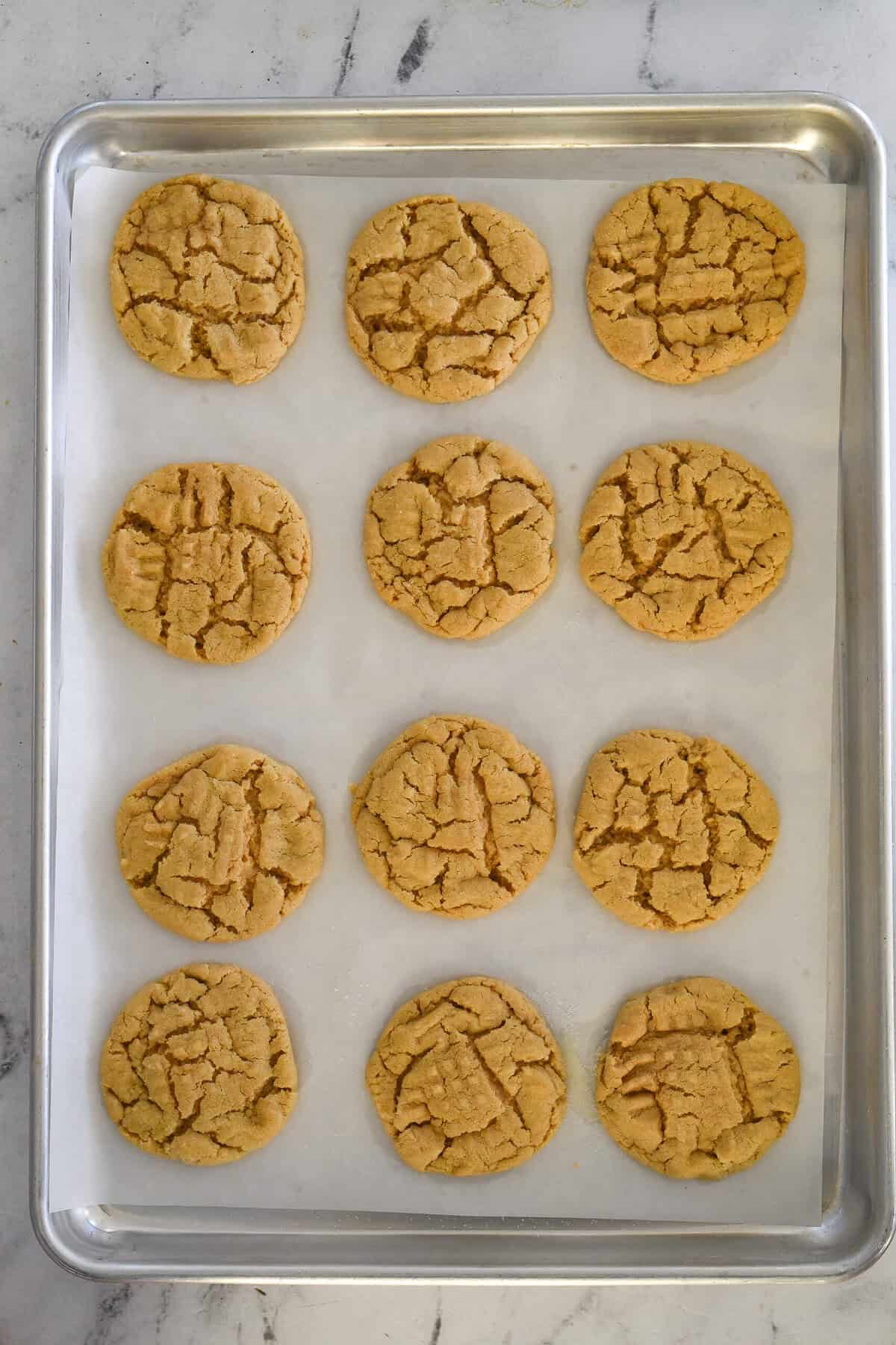 peanut butter cookies on a baking sheet